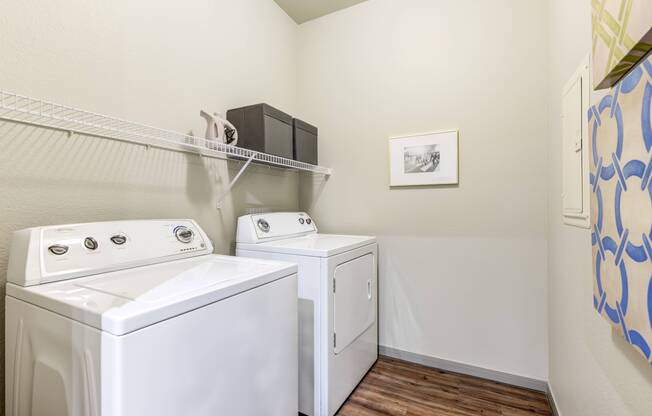 Laundry room with in-unit washer and dryer at Avenues at Craig Ranch apartments for rent in Dallas, TX