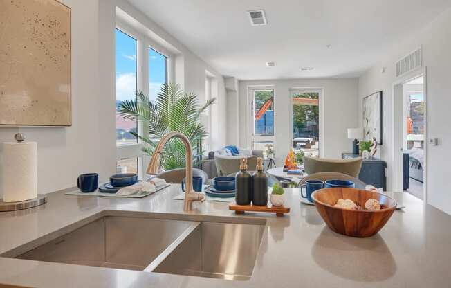 a kitchen with a sink and a window