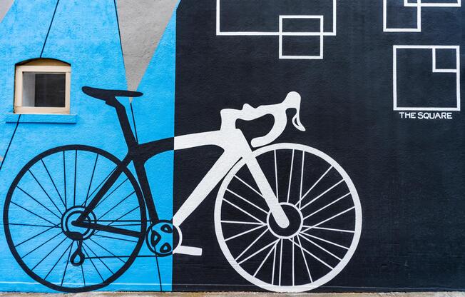 Public art and bike-friendly amenities in Downtown McKinney add local character and connect residents of Modera Ridgeline to an active, creative community.
