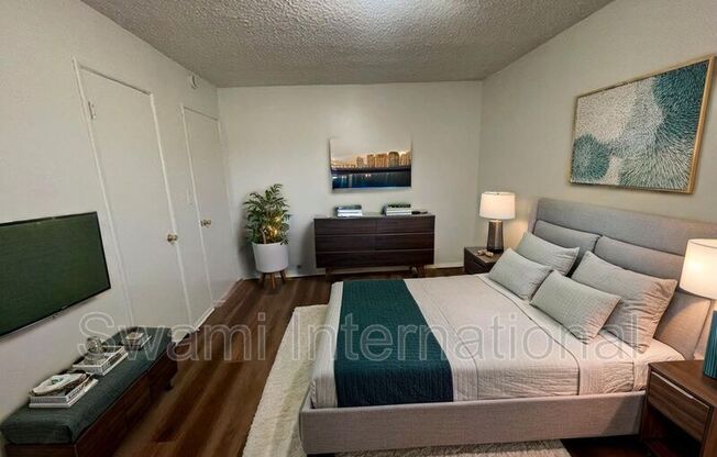1303 W 107 ST