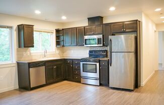 Contemporary Top-Floor Corner 2 Bedroom w/ Balcony, Dishwasher & Laundry!