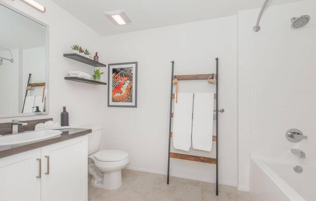 a room with a sink and a mirror