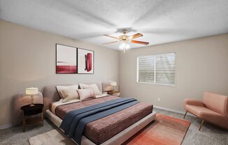 a bedroom with a bed and a ceiling fan