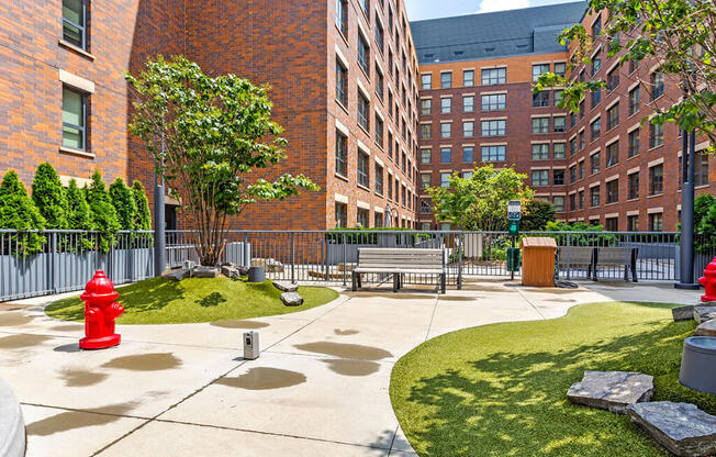 Outdoor dog park at The Madison at Racine, Chicago, IL, 60607