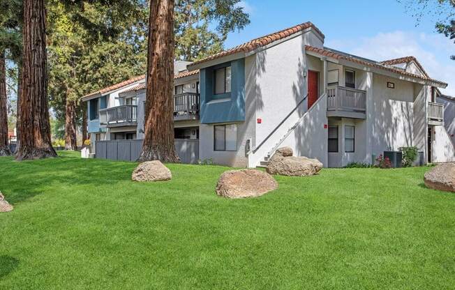 Exterior Community Building and Landscape at Creek 2645 Apartments in Sacramento, CA.
