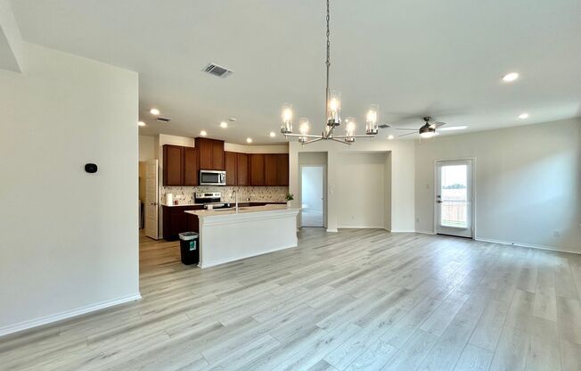 Spacious & Updated 4/BR 3/5/BA Home with Main Floor Primary Suite!