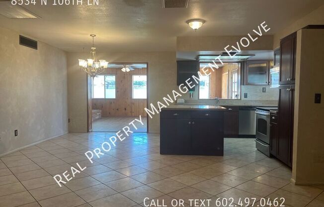 8534 N 106 LN
