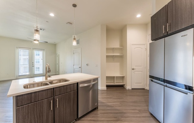 Kitchen With Inbuilt Wash Basin at Residences at 3000 Bardin Road, Grand Prairie, TX, Texas