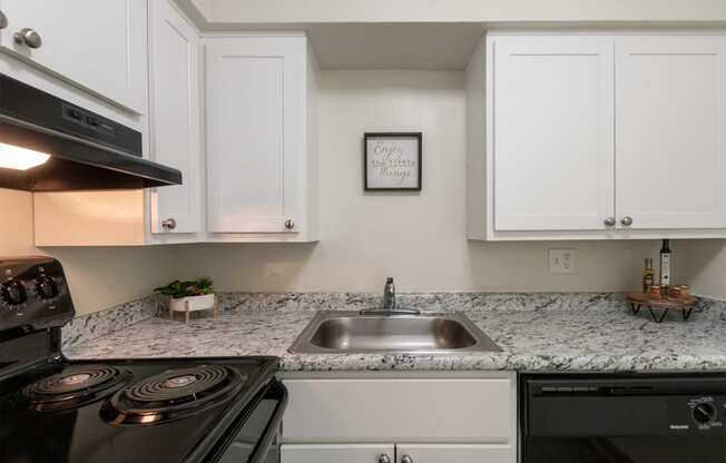 This is a photo of the kitchen in a 560 square foot, 1 bedroom, 1 bath apartment at Aspen Village Apartments in Cincinnati, OH.