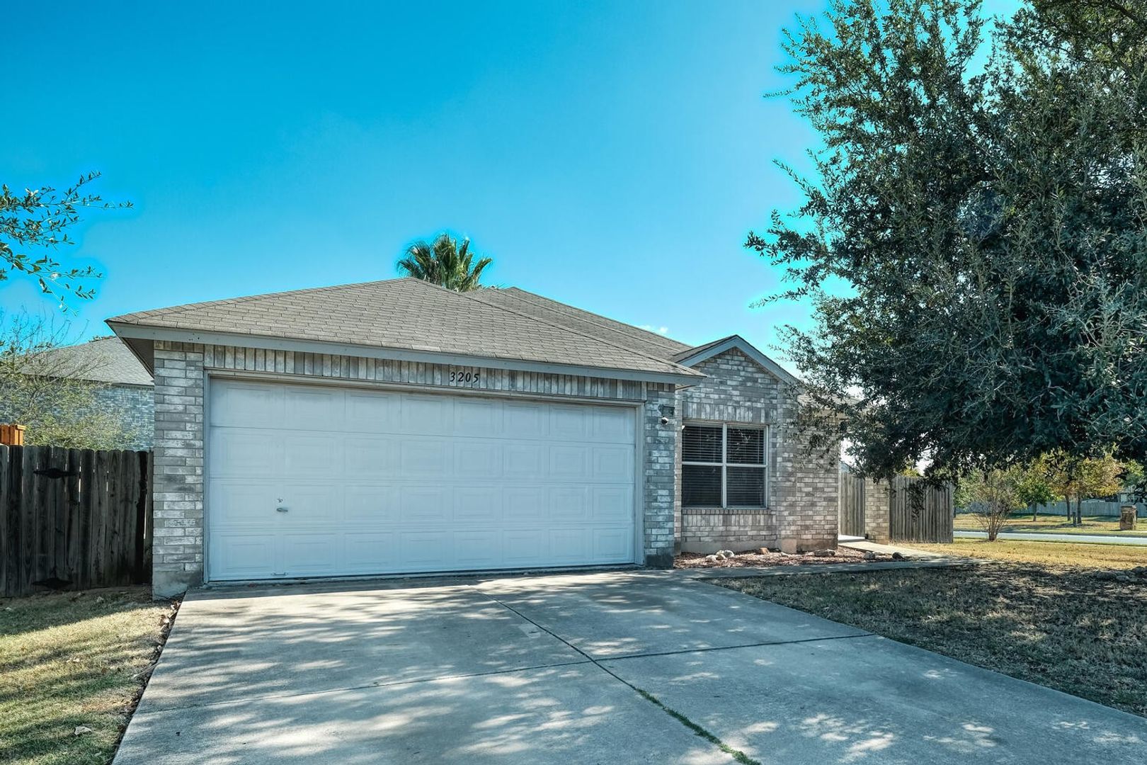 Cute 3/2/2 on corner lot, across the street from Meadow Lake!