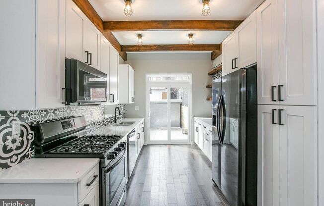 Gorgeously renovated classic row home bordering Brewerytown and Fairmount Park