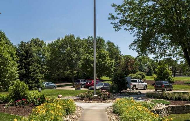 Flag pole with the United States Flag at Fountain Glen Apartments