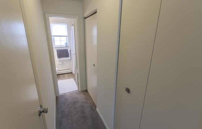 This is a photo of the hallway in the 740 square foot 1 bedroom model apartment at Compton Lake Apartments in Mt. Healthy, OH.