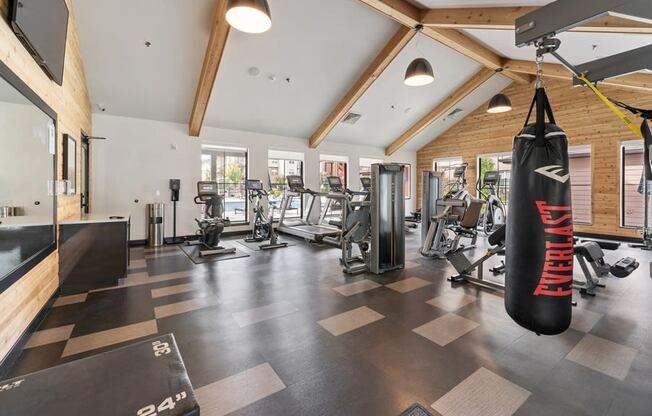 the gym with weights and cardio equipment at the oxford condos tx