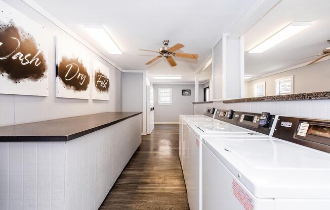 a kitchen with a table in a room