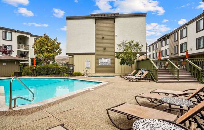 our apartments have a pool and lounge chairs