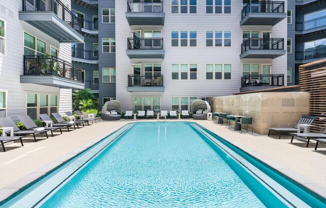 Soak up the sun or cool off in the crystal-clear pool—this courtyard oasis is your personal retreat, perfect for relaxing or entertaining.