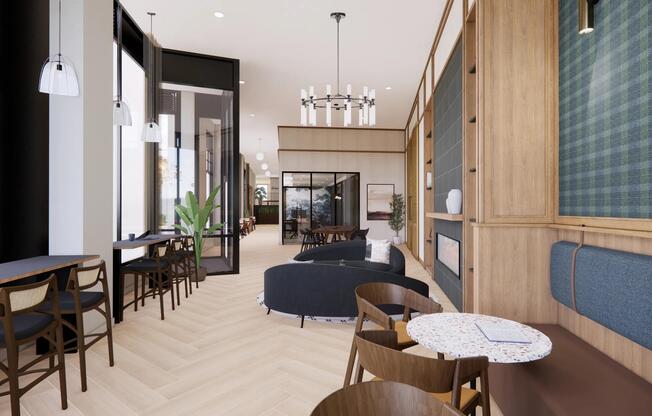 Thoughtfully designed gathering spaces with flexible seating, integrated work areas, and inviting finishes.