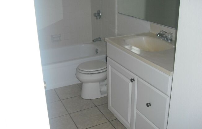 Lovely 2 bedroom Penthouse Condo with garage & pool