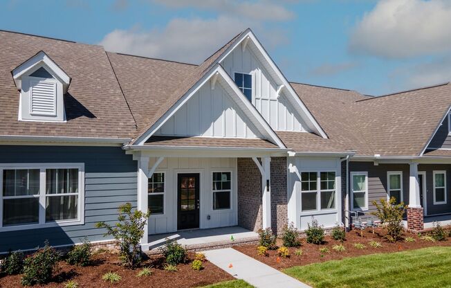 **BE THE LUCKY ONE TO LIVE IN THIS 2022-BUILT NEW UPSCALE COTTAGE HOME IN THE PRESERVE AT BELLE POINTE**