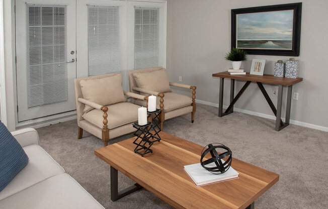 Living room with patio or balcony