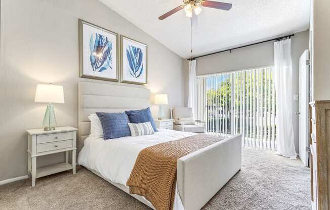 a bedroom with a bed and a ceiling fan at Waterford Park Apartment Homes, LLC, Lauderhill, FL 33319