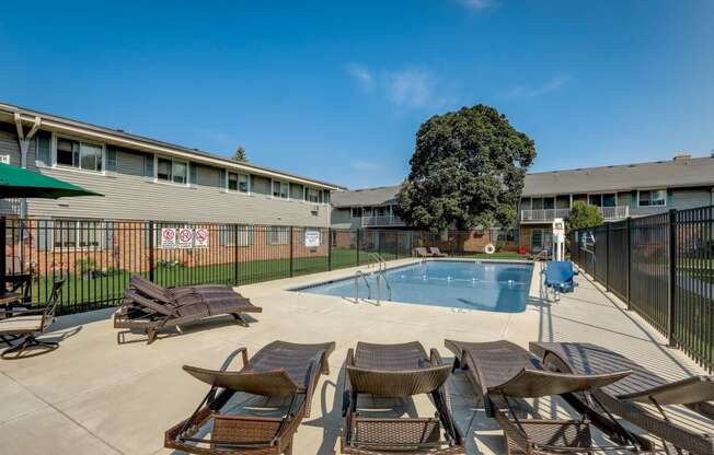 our apartments have a large pool and lounge chairs