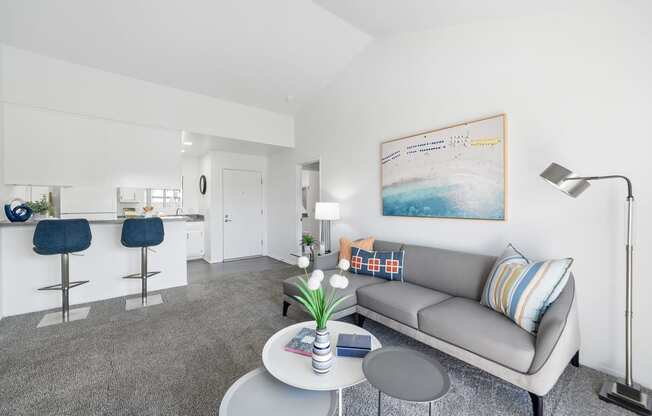 a living room with a couch and a coffee table