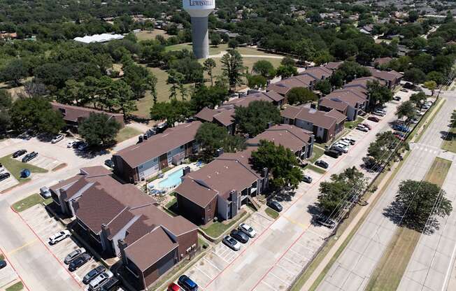 A bird's eye view of a residential area with a sign that reads "Leesburg".