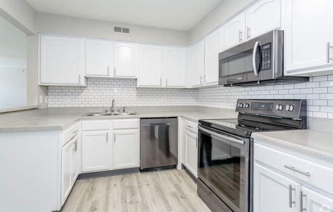 Renovated kitchen with stainless steel appliances