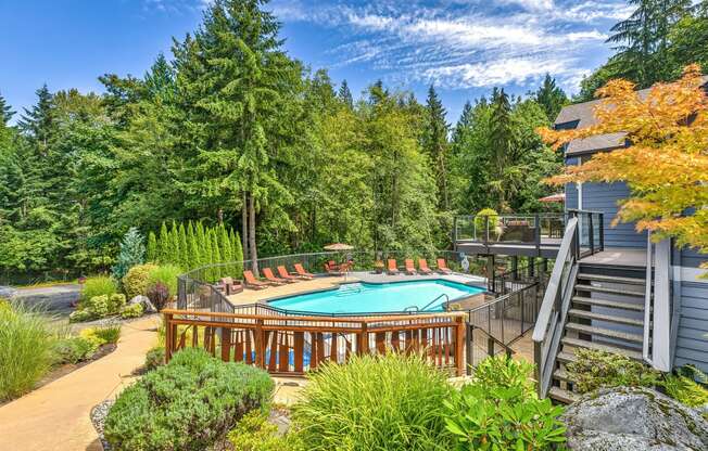 Apartments for Rent in Issaquah WA - Lakemont Orchard - Gated Pool Surrounded by Lounge Seating