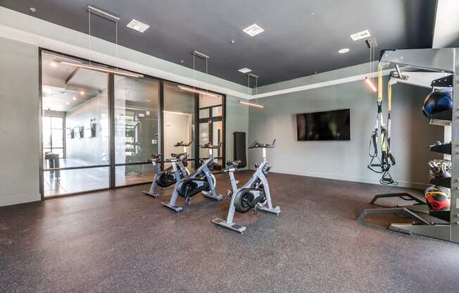 A spacious gym with a variety of exercise equipment.