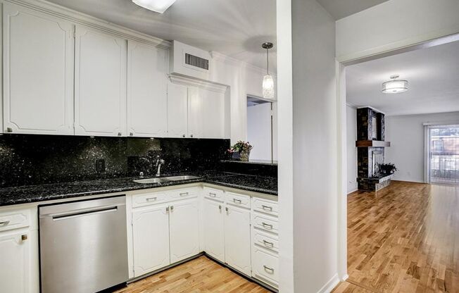 Beautifully remodeled two-story condo in a gated, centrally located community.