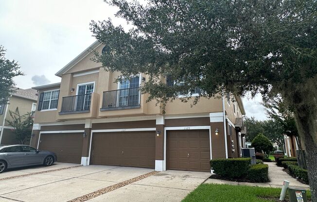 Charming 2-Bedroom Townhome in Highly Desirable Winter Garden | Gated Community with Abundant Amenities | Fully Tiled, Newer Appliances & Inside Laundry | One-Car Garage Included