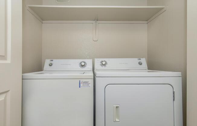a kitchen with a sink and a refrigerator