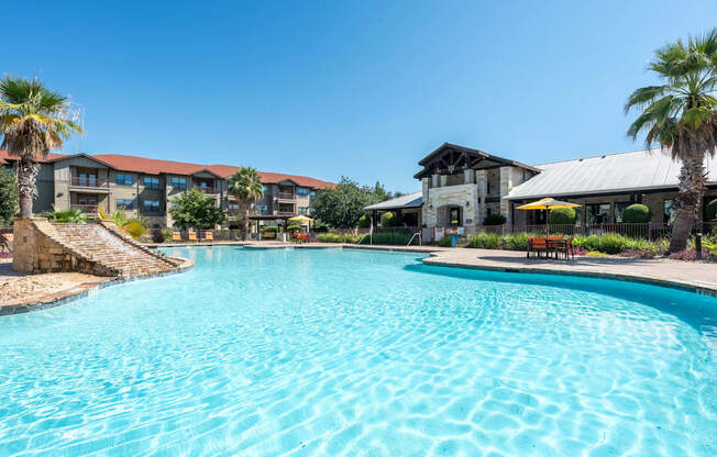Swimming Pool with Leasing Office in Background