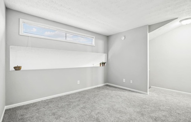 Versatile and airy loft room at Pine Village North in Smyrna, GA