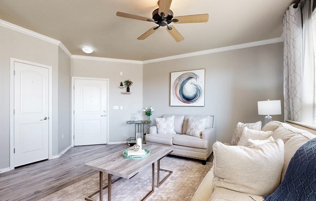Relax in this beautifully styled living room, where comfort meets elegance.