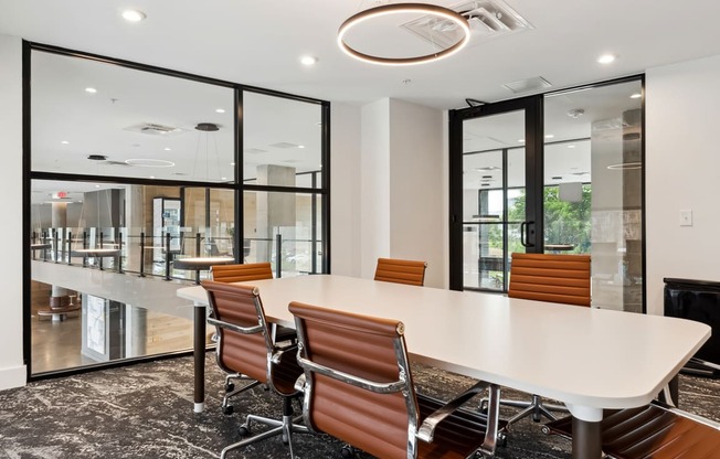 a conference room with a long table and chairs at Hydro, Richmond