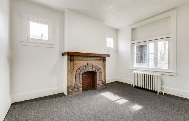 Available NOW - Traditional style 4+ bed home w/ updated appliances & garage!