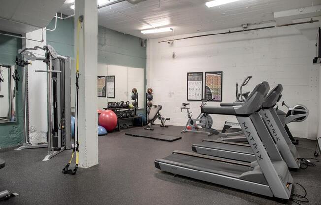 fitness center with treadmills