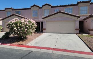 HIGHLY UPGRADED 2-STORY TOWNHOME IN GATED COMMUNITY!
