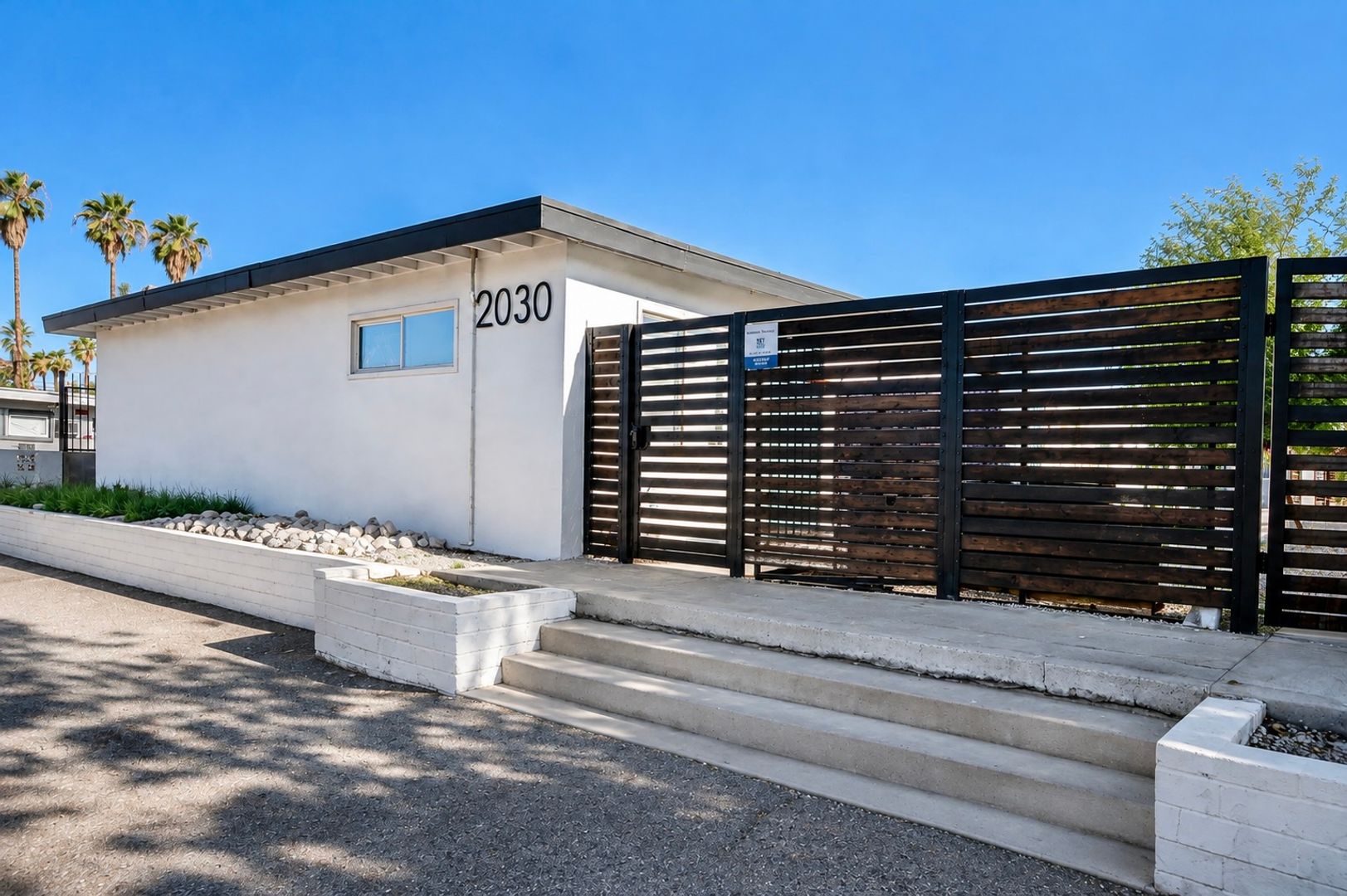 Gated Courtyard Living with Easy Freeway Access