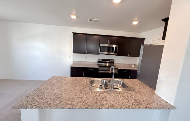 Stunning Tri-Level Townhome with Breathtaking Nevada Mountain Views