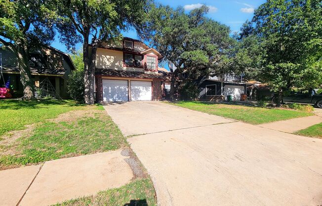 Warm & Inviting 4BR / 2.5BA Home with Covered Deck and 2-Car Garage