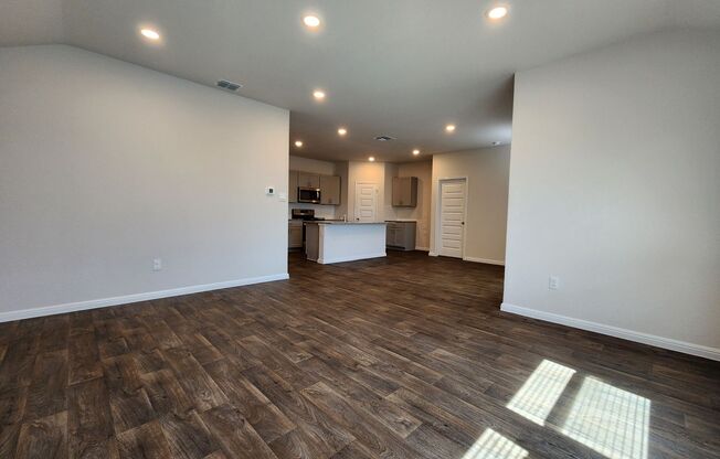 New Construction /Smart Home Technology / Luxury Vinyl Plank w Carpet in Bedrooms /  Covered Patio / Fenced in Yard / CISD