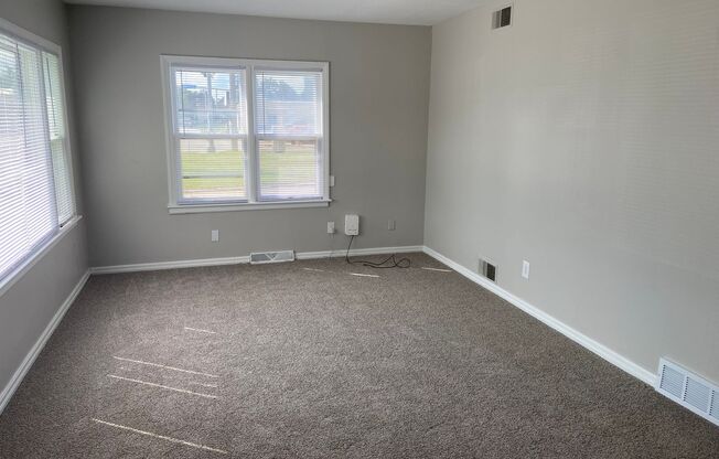 MOVE IN SPECIAL! 3 Bedroom Home with Huge Detached Garage!