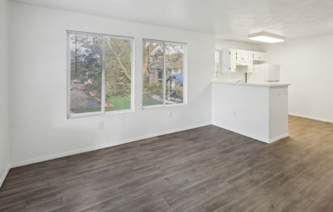 a reflection of people walking down a staircase in a glass window