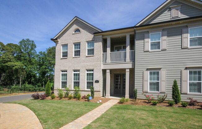 Beautiful John Wieland end unit townhouse never lived in, located in the heart of Waverly.