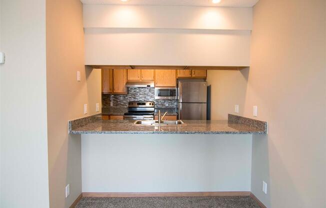 Interiors-Skyline View Apartments Updated Kitchen and Breakfast Bar in Lincoln NE